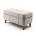 Storage ottoman in light gray fabric with wooden legs 90 x 45 x 45cm